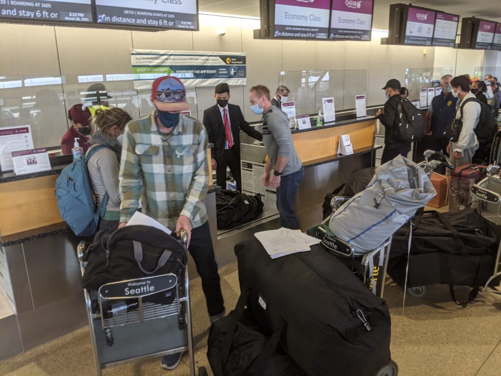Guides Mark Postle and Casey Grom Loading almost a dozen duffels at the airport